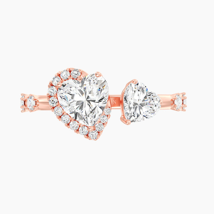 18K Rose Gold Toi et Moi Double Heart Diamond Engagement Open Cuff Ring showcasing a 1.00ct and 0.50ct heart-cut lab-grown diamond with 17 round accent diamonds (0.26ct total), in a warm rose gold prong setting