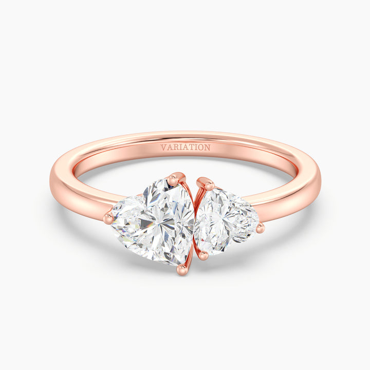 18K Rose Gold Toi et Moi Double Heart Diamond Engagement Ring featuring a 1.00ct and 0.50ct heart-cut lab-grown diamond in a romantic prong setting, crafted in warm rose gold