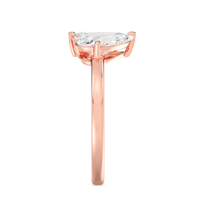 18K Rose Gold Toi et Moi Double Pear Diamond Engagement Ring with two pear-cut lab-grown diamonds (1.25ct and 0.75ct), set in a romantic prong setting on a warm rose gold band, representing eternal love.