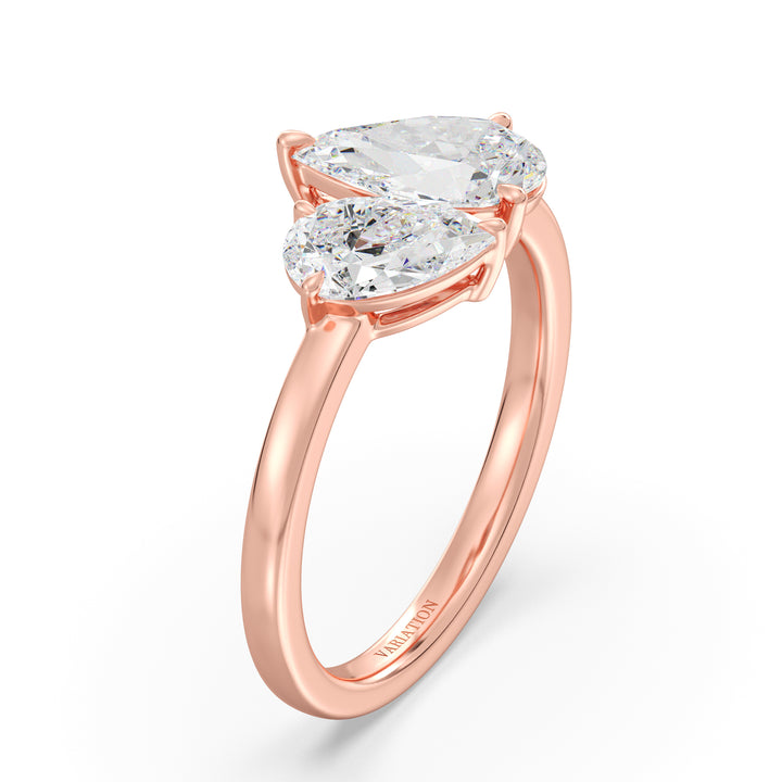 18K Rose Gold Toi et Moi Double Pear Diamond Engagement Ring with two pear-cut lab-grown diamonds (1.25ct and 0.75ct), set in a romantic prong setting on a warm rose gold band, representing eternal love.