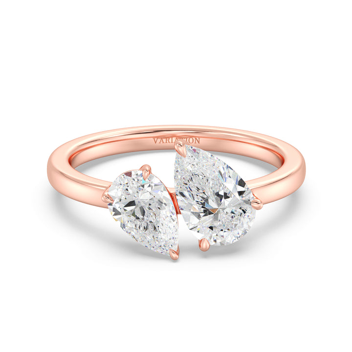 18K Rose Gold Toi et Moi Double Pear Diamond Engagement Ring with two pear-cut lab-grown diamonds (1.25ct and 0.75ct), set in a romantic prong setting on a warm rose gold band, representing eternal love.