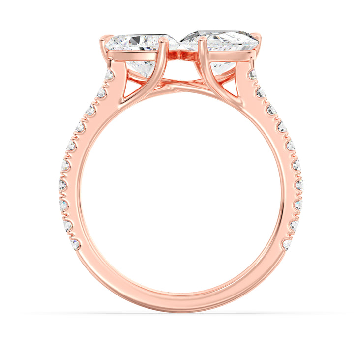 18K Rose Gold Toi et Moi Engagement Ring featuring a 1.50ct Pear-Cut and 1.00ct Heart-Shaped Lab-Grown Diamond, set in a classic prong setting with a pavé diamond band. A timeless and elegant symbol of love in warm rose gold