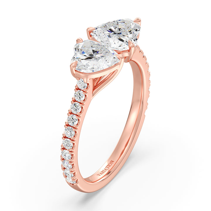 18K Rose Gold Toi et Moi Heart-Cut Diamond Engagement Ring with two 1.0ct EF/VS heart-cut lab-grown diamonds set in a classic prong setting. The pavé band sparkles with 20 round-cut lab-grown diamonds (0.36ct total), adding elegance to this romantic two-stone ring