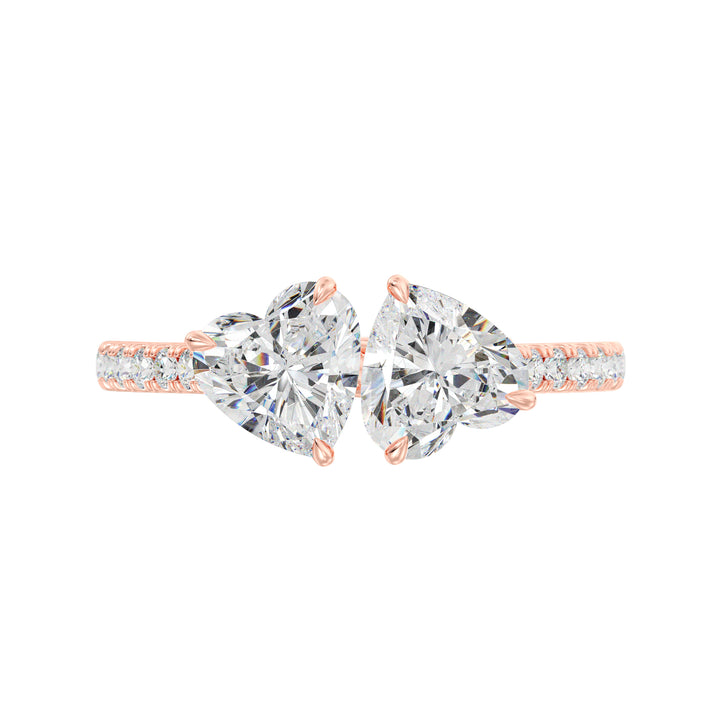 18K Rose Gold Toi et Moi Heart-Cut Diamond Engagement Ring with two 1.0ct EF/VS heart-cut lab-grown diamonds set in a classic prong setting. The pavé band sparkles with 20 round-cut lab-grown diamonds (0.36ct total), adding elegance to this romantic two-stone ring