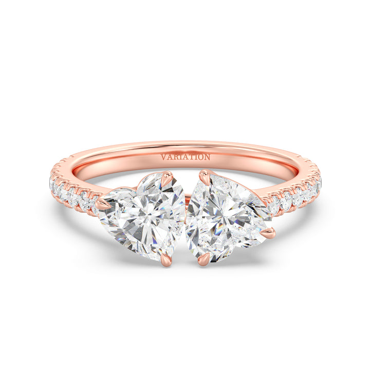 18K Rose Gold Toi et Moi Heart-Cut Diamond Engagement Ring with two 1.0ct EF/VS heart-cut lab-grown diamonds set in a classic prong setting. The pavé band sparkles with 20 round-cut lab-grown diamonds (0.36ct total), adding elegance to this romantic two-stone ring