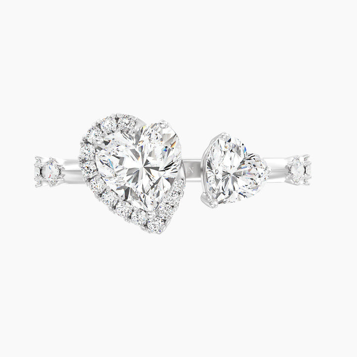 18K White Gold Toi et Moi Double Heart Diamond Engagement Open Cuff Ring adorned with a 1.00ct and 0.50ct heart-cut lab-grown diamond and 17 round accent diamonds (0.26ct total), in a sleek white gold prong setting