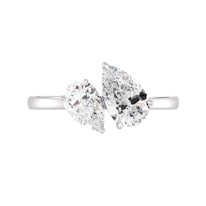 18K White Gold Toi et Moi Double Pear Diamond Engagement Ring showcasing a 1.25ct and 0.75ct pear-cut lab-grown diamond in a classic prong setting, elegantly mounted on a sleek white gold band for a timeless look