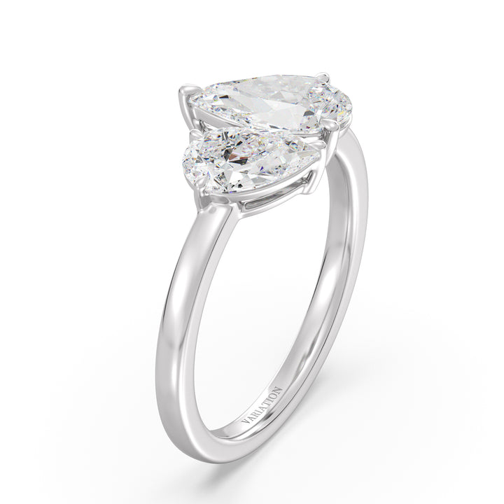 18K White Gold Toi et Moi Double Pear Diamond Engagement Ring showcasing a 1.25ct and 0.75ct pear-cut lab-grown diamond in a classic prong setting, elegantly mounted on a sleek white gold band for a timeless look