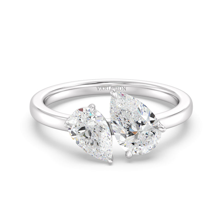 18K White Gold Toi et Moi Double Pear Diamond Engagement Ring showcasing a 1.25ct and 0.75ct pear-cut lab-grown diamond in a classic prong setting, elegantly mounted on a sleek white gold band for a timeless look