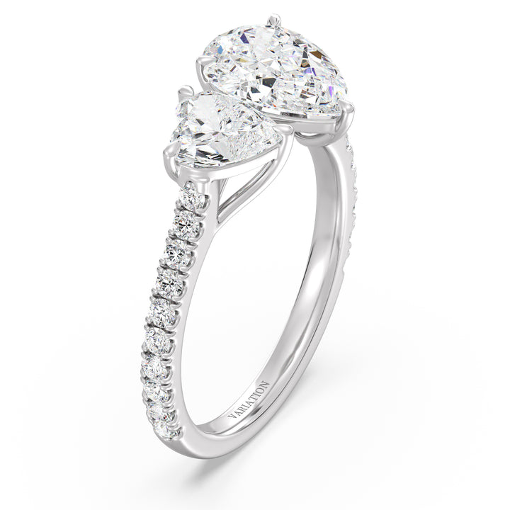 18K White Gold Toi et Moi Engagement Ring showcasing a 1.50ct Pear-Cut and 1.00ct Heart-Shaped Lab-Grown Diamond, enhanced by a pavé band with 20 round-cut diamonds (0.36ct total). A sophisticated two-stone ring in luminous white gold