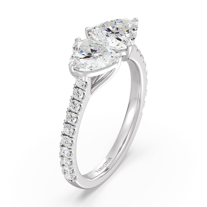 18K White Gold Toi et Moi Heart-Cut Diamond Engagement Ring showcasing two 1.0ct EF/VS heart-cut lab-grown diamonds in a prong setting. The pavé band, set with 20 round-cut lab-grown diamonds (0.36ct total), enhances the brilliance of this sophisticated two-stone ring