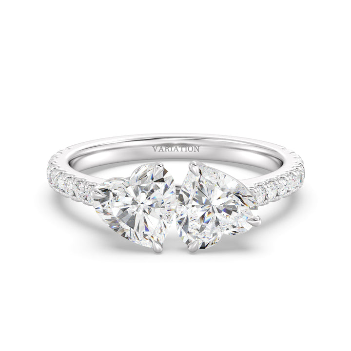 18K White Gold Toi et Moi Heart-Cut Diamond Engagement Ring showcasing two 1.0ct EF/VS heart-cut lab-grown diamonds in a prong setting. The pavé band, set with 20 round-cut lab-grown diamonds (0.36ct total), enhances the brilliance of this sophisticated two-stone ring