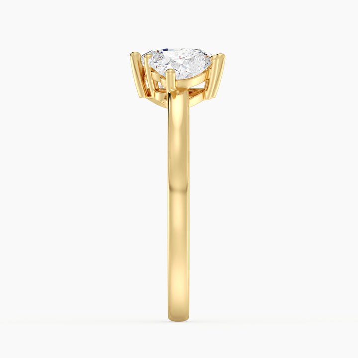 18K Yellow Gold Toi et Moi Double Heart Diamond Engagement Ring with a 1.00ct and 0.50ct heart-cut lab-grown diamond in a classic prong setting, symbolizing love and unity