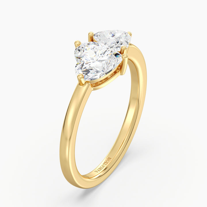 18K Yellow Gold Toi et Moi Double Heart Diamond Engagement Ring with a 1.00ct and 0.50ct heart-cut lab-grown diamond in a classic prong setting, symbolizing love and unity