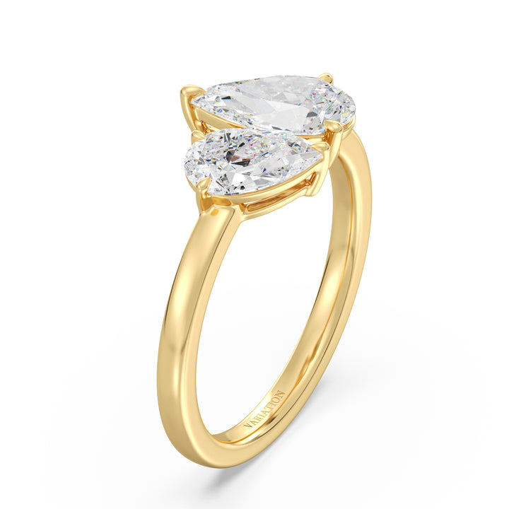 18K Yellow Gold Toi et Moi Double Pear Diamond Engagement Ring featuring a 1.25ct and 0.75ct pear-cut lab-grown diamond in a classic prong setting, symbolizing 'you and me' on a polished yellow gold band