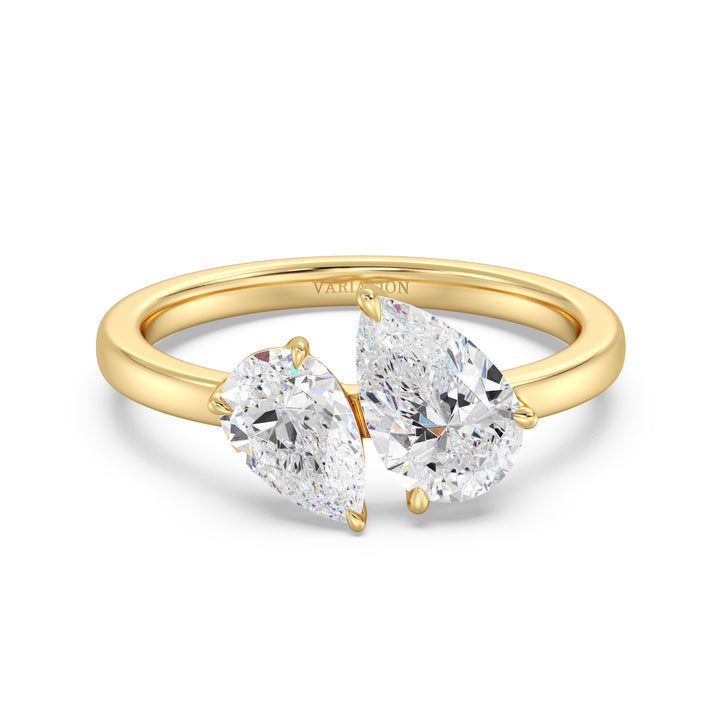 18K Yellow Gold Toi et Moi Double Pear Diamond Engagement Ring featuring a 1.25ct and 0.75ct pear-cut lab-grown diamond in a classic prong setting, symbolizing 'you and me' on a polished yellow gold band