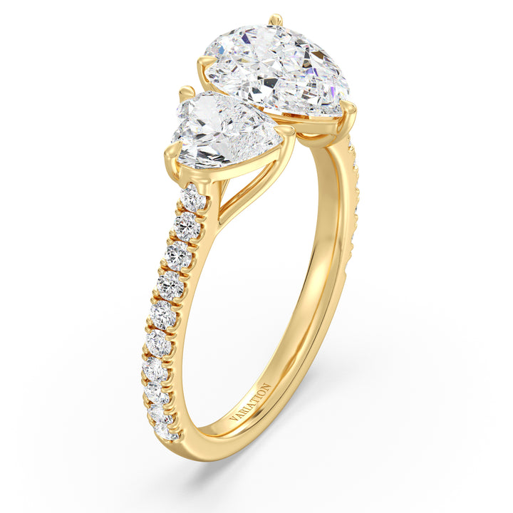 18K Yellow Gold Toi et Moi Engagement Ring with a 1.50ct Pear-Cut and 1.00ct Heart-Shaped Lab-Grown Diamond, accented by a pavé band with 20 round-cut diamonds (0.36ct total). A romantic two-stone design symbolizing love and unity