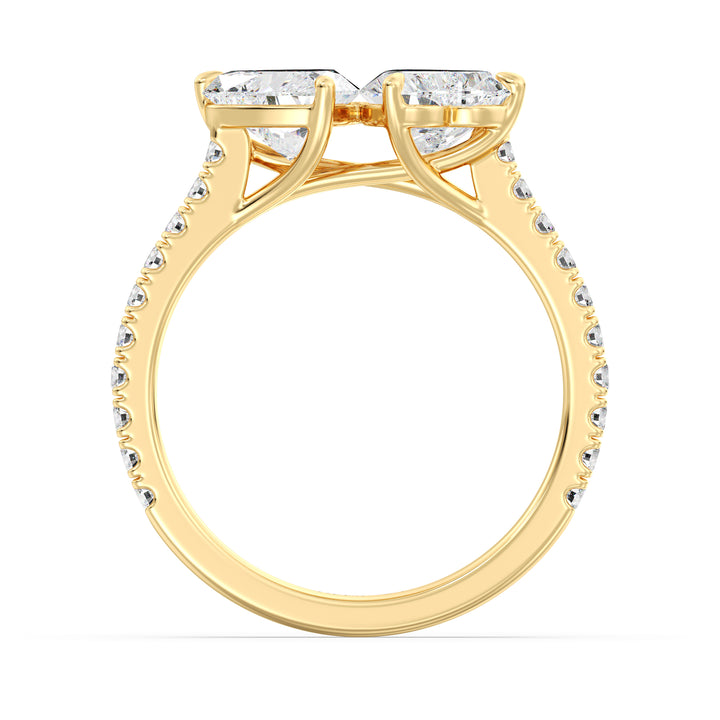 18K Yellow Gold Toi et Moi Heart-Cut Diamond Engagement Ring featuring two 1.0ct EF/VS heart-cut lab-grown diamonds in a classic prong setting with a pavé band adorned with 20 round-cut lab-grown diamonds (0.36ct total). A timeless and romantic two-stone ring
