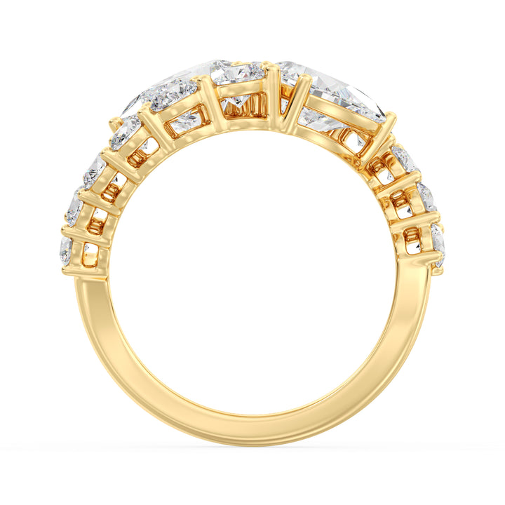 A breathtaking 18K yellow gold Toi et Moi bypass ring featuring two pear-cut lab-grown diamonds (1.50ct each) set in a classic prong setting. The ring is adorned with 12 round lab-grown diamonds (1.60ct total), enhancing its 4.60ct total carat weight. The warm yellow gold band beautifully complements the brilliance of the EF color, VS clarity diamonds, making it a timeless choice for engagements, anniversaries, or special occasions