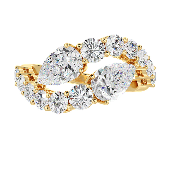 A breathtaking 18K yellow gold Toi et Moi bypass ring featuring two pear-cut lab-grown diamonds (1.50ct each) set in a classic prong setting. The ring is adorned with 12 round lab-grown diamonds (1.60ct total), enhancing its 4.60ct total carat weight. The warm yellow gold band beautifully complements the brilliance of the EF color, VS clarity diamonds, making it a timeless choice for engagements, anniversaries, or special occasions