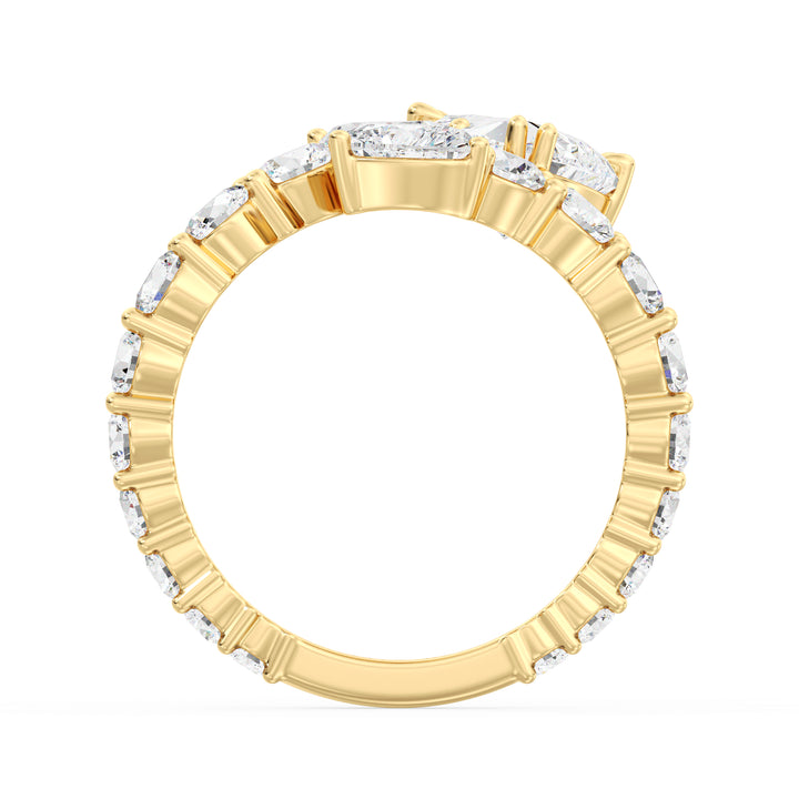 A breathtaking Three-Stone 'Toi et Moi' Heart-Shaped Lab-Grown Diamond Cluster Ring in 18K Yellow Gold, featuring two 0.50ct EF/VS heart-cut lab-grown diamonds, a 1.00ct EF/VS heart-cut lab-grown diamond, and 18 round lab-grown diamonds, totaling 4.17ct. The classic prong setting enhances brilliance, while the warm yellow gold band adds a timeless touch.