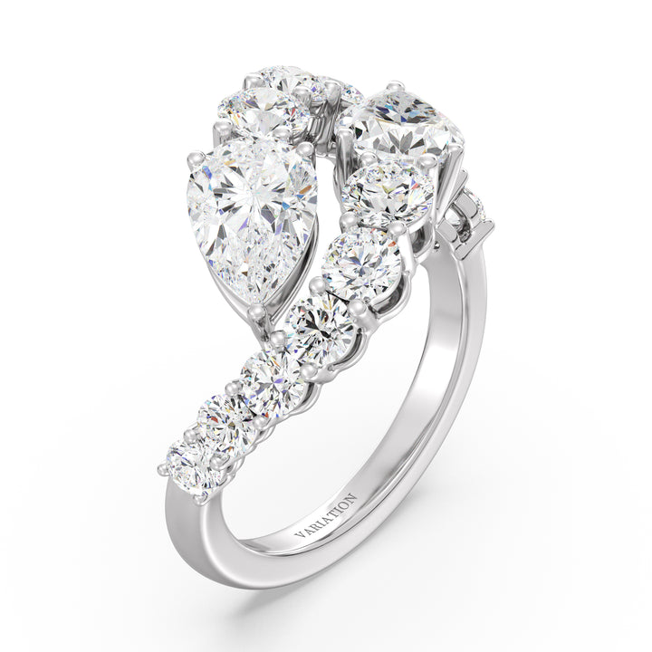 An elegant 18K white gold Toi et Moi bypass ring featuring two pear-cut lab-grown diamonds (1.50ct each) set in a timeless prong setting. The sleek white gold band enhances the brilliance of the EF color, VS clarity diamonds, complemented by 12 round lab-grown diamonds (1.60ct total), creating a dazzling 4.60ct total carat weight piece. A sophisticated and classic choice for engagements, anniversaries, or a luxurious statement ring