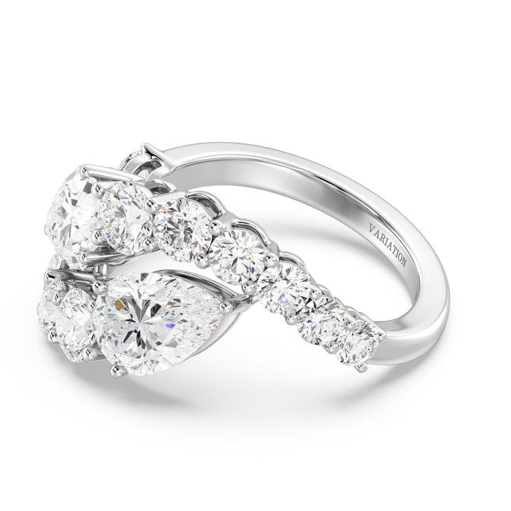 An elegant 18K white gold Toi et Moi bypass ring featuring two pear-cut lab-grown diamonds (1.50ct each) set in a timeless prong setting. The sleek white gold band enhances the brilliance of the EF color, VS clarity diamonds, complemented by 12 round lab-grown diamonds (1.60ct total), creating a dazzling 4.60ct total carat weight piece. A sophisticated and classic choice for engagements, anniversaries, or a luxurious statement ring