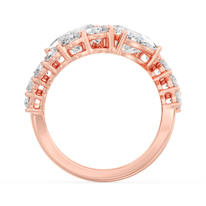 A romantic 18K rose gold Toi et Moi bypass ring showcasing two pear-cut lab-grown diamonds (1.50ct each) in a classic prong setting. The soft pink hue of the rose gold band enhances the sparkle of the 12 round lab-grown diamonds (1.60ct total), creating a stunning 4.60ct total carat weight design. This elegant and modern ring symbolizes love and connection, perfect for engagements, anniversaries, or a heartfelt gift
