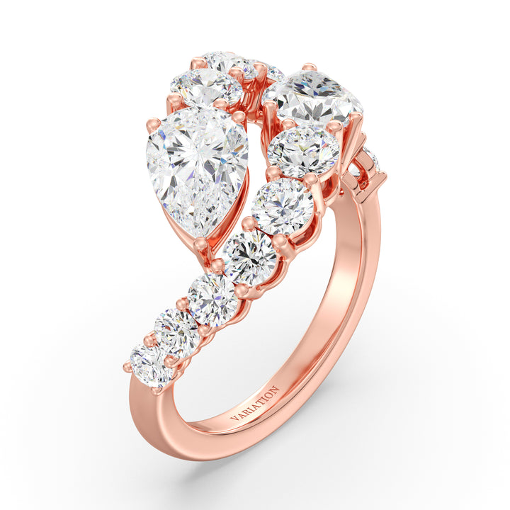 A romantic 18K rose gold Toi et Moi bypass ring showcasing two pear-cut lab-grown diamonds (1.50ct each) in a classic prong setting. The soft pink hue of the rose gold band enhances the sparkle of the 12 round lab-grown diamonds (1.60ct total), creating a stunning 4.60ct total carat weight design. This elegant and modern ring symbolizes love and connection, perfect for engagements, anniversaries, or a heartfelt gift