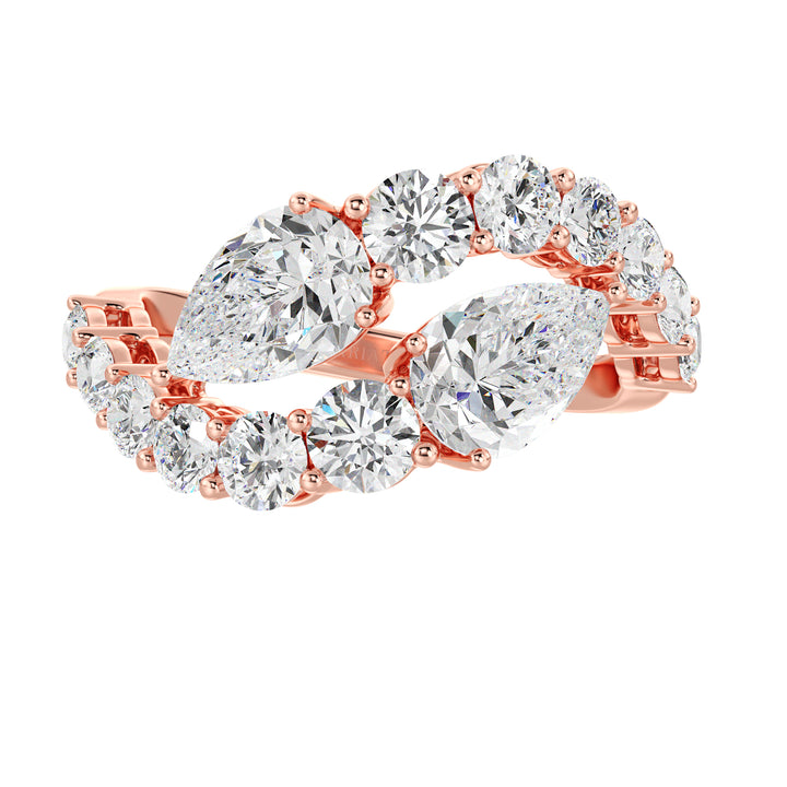A romantic 18K rose gold Toi et Moi bypass ring showcasing two pear-cut lab-grown diamonds (1.50ct each) in a classic prong setting. The soft pink hue of the rose gold band enhances the sparkle of the 12 round lab-grown diamonds (1.60ct total), creating a stunning 4.60ct total carat weight design. This elegant and modern ring symbolizes love and connection, perfect for engagements, anniversaries, or a heartfelt gift