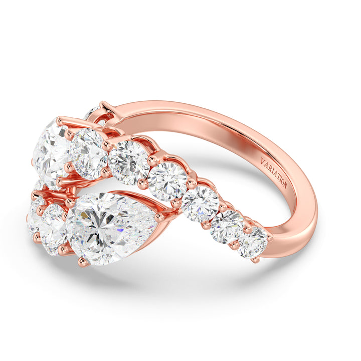 A romantic 18K rose gold Toi et Moi bypass ring showcasing two pear-cut lab-grown diamonds (1.50ct each) in a classic prong setting. The soft pink hue of the rose gold band enhances the sparkle of the 12 round lab-grown diamonds (1.60ct total), creating a stunning 4.60ct total carat weight design. This elegant and modern ring symbolizes love and connection, perfect for engagements, anniversaries, or a heartfelt gift