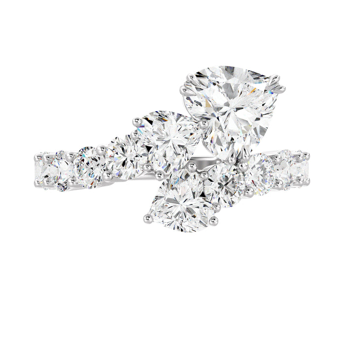 A sophisticated Three-Stone 'Toi et Moi' Heart-Shaped Lab-Grown Diamond Cluster Ring in 18K White Gold, featuring two 0.50ct EF/VS heart-cut lab-grown diamonds, a 1.00ct EF/VS heart-cut lab-grown diamond, and 18 round lab-grown diamonds, totaling 4.17ct. The cool-toned white gold band enhances the diamonds' brilliance, creating an elegant and modern look.