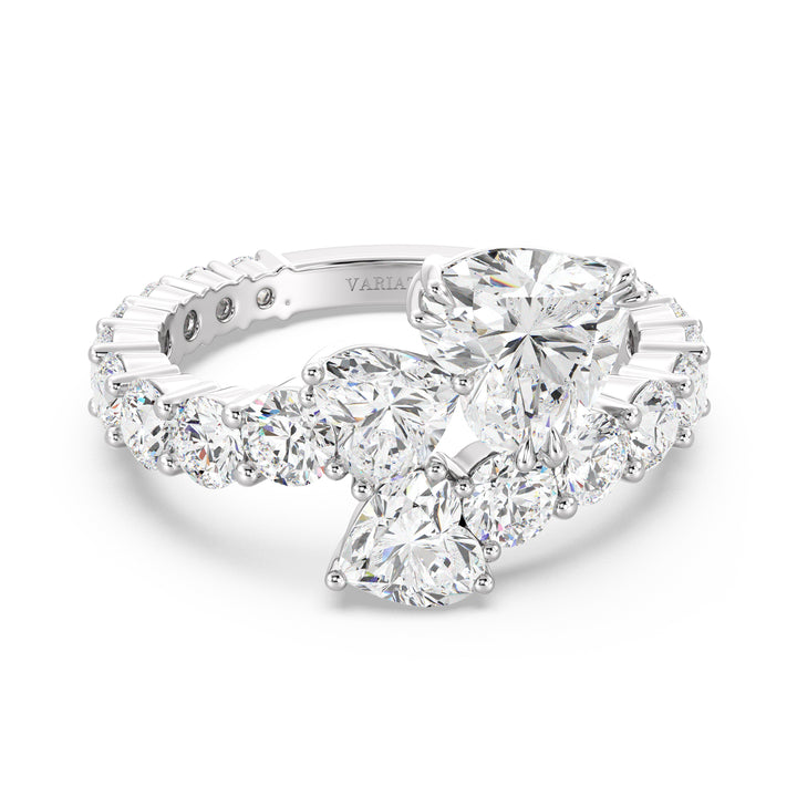 A sophisticated Three-Stone 'Toi et Moi' Heart-Shaped Lab-Grown Diamond Cluster Ring in 18K White Gold, featuring two 0.50ct EF/VS heart-cut lab-grown diamonds, a 1.00ct EF/VS heart-cut lab-grown diamond, and 18 round lab-grown diamonds, totaling 4.17ct. The cool-toned white gold band enhances the diamonds' brilliance, creating an elegant and modern look.