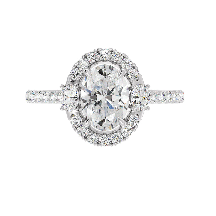 Elegant 18K white gold oval lab-grown diamond halo engagement ring with 1.50ct center stone, side oval diamonds, and pavé round diamond accents