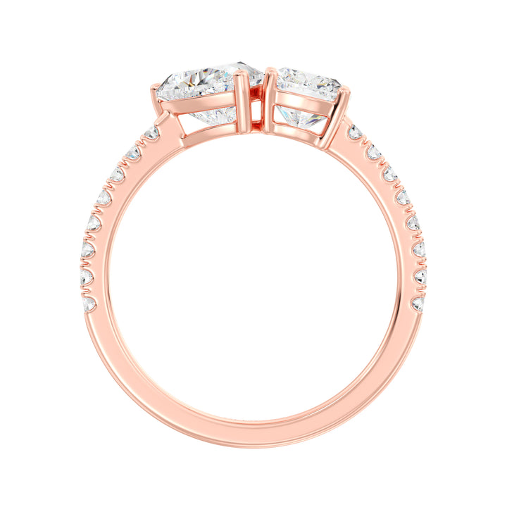 Elegant Heart & Cushion Two-Stone Lab-Grown Diamond 'Toi et Moi' Ring in 18K Rose Gold. Showcasing a 1.00ct heart-cut and a 1.00ct cushion-cut EF/VS lab-grown diamond, with 16 round-cut diamonds (0.24ct) adorning the warm rose gold band