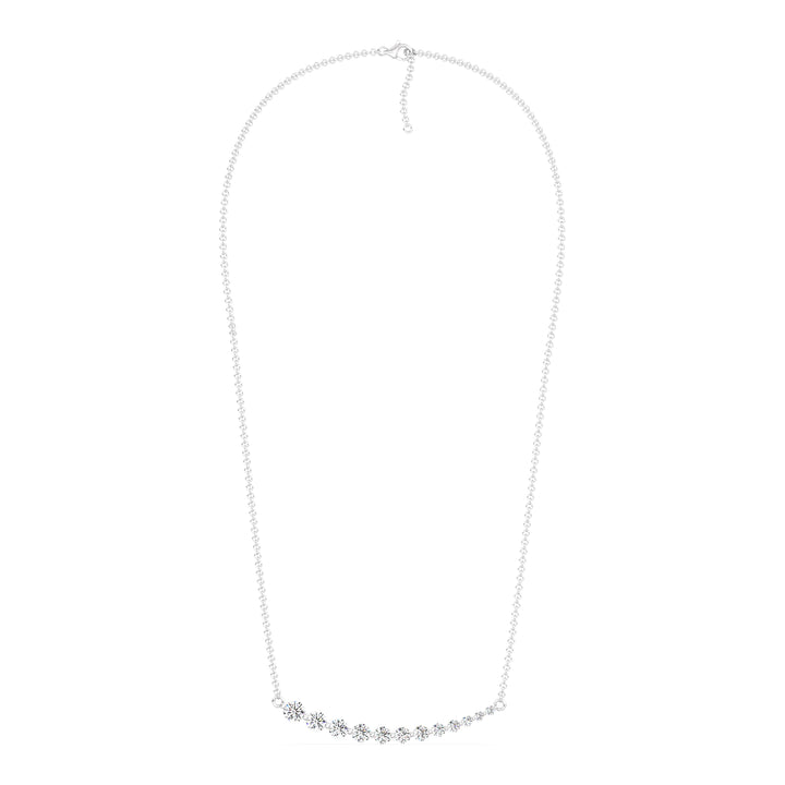Elegant asymmetric smile necklace in 18K white gold adorned with 12 graduated round-cut lab-grown diamonds totaling 0.80ct in prong setting