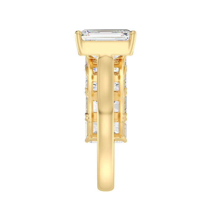 Floating Emerald-Cut Lab-Grown Diamond Ring in 18K Yellow Gold featuring a 2.00ct emerald-cut center stone and five 0.50ct floating emerald-cut diamonds in a prong setting. A modern Toi et Moi design with a sleek yellow gold band, perfect for stacking or as an anniversary gift.