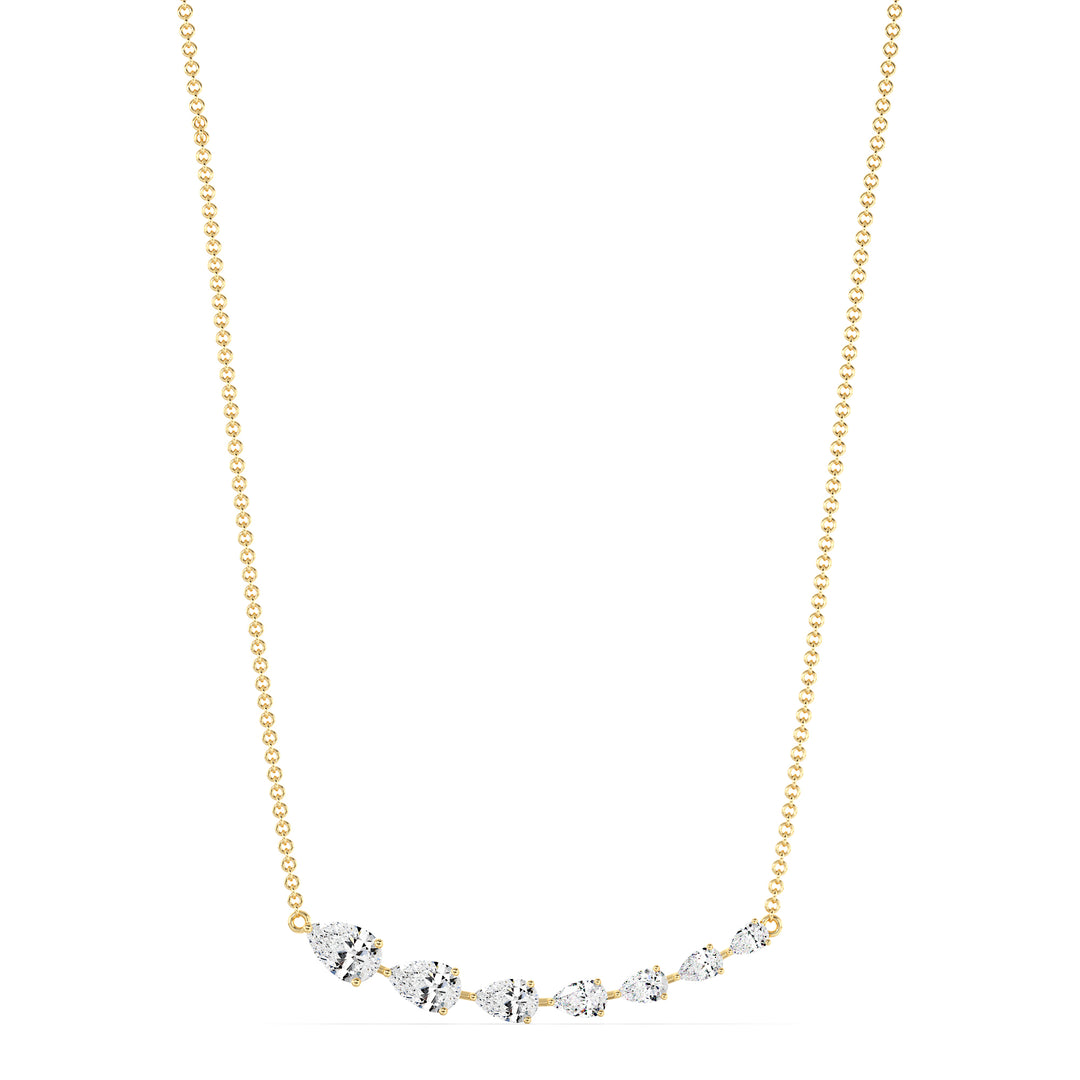 Graduated pear-cut lab-grown diamond necklace in 18K yellow gold with 7 EF/VS diamonds totaling 3.07 carats in a prong setting and asymmetric smile design