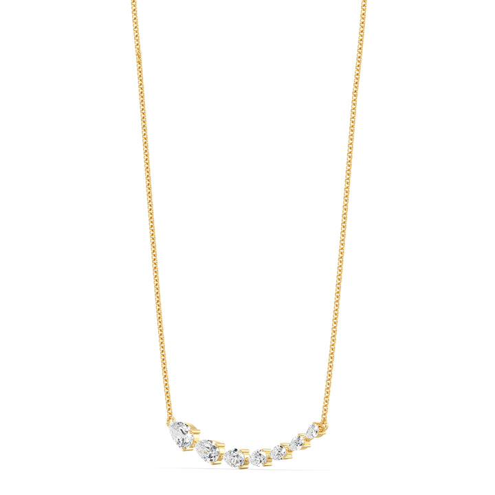 Graduated pear-cut lab-grown diamond necklace in 18K yellow gold with 7 EF/VS diamonds totaling 3.07 carats in a prong setting and asymmetric smile design