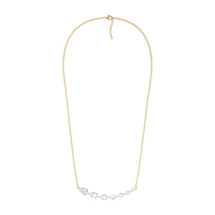 Graduated pear-cut lab-grown diamond necklace in 18K yellow gold with 7 EF/VS diamonds totaling 3.07 carats in a prong setting and asymmetric smile design