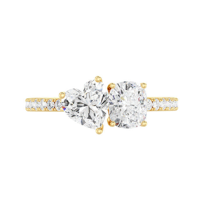Heart & Cushion Two-Stone Lab-Grown Diamond 'Toi et Moi' Ring in 18K Yellow Gold. Featuring a 1.00ct heart-cut and a 1.00ct cushion-cut EF/VS lab-grown diamond in a classic prong setting, accented with 16 round-cut diamonds (0.24ct) on a sleek yellow gold band