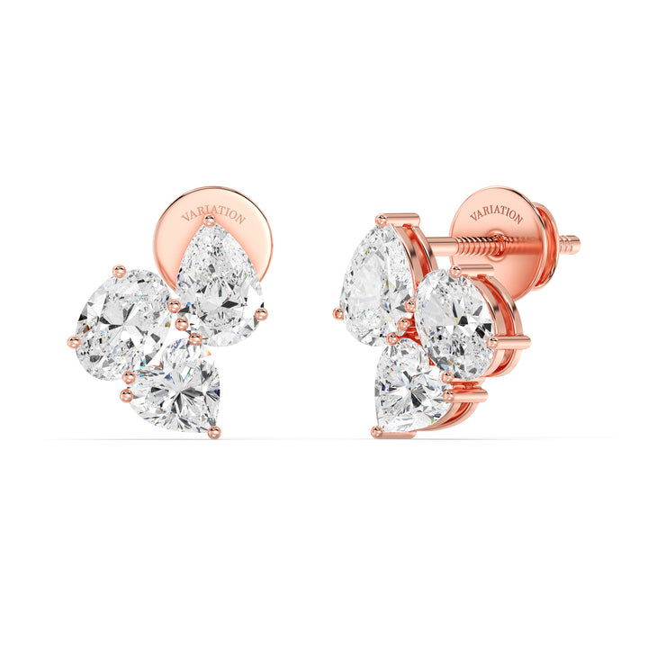Nebula Flower Lab-Grown Diamond Stud Earrings in 18K Rose Gold with heart, pear, and oval EF/VS lab-grown diamonds in a gallery-inspired floral setting