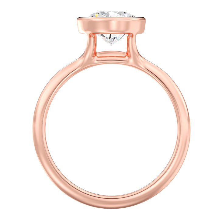 Oval-cut lab-grown diamond solitaire ring set in 18K rose gold, featuring a sleek bezel setting that enhances the brilliance of the EF/VS diamond