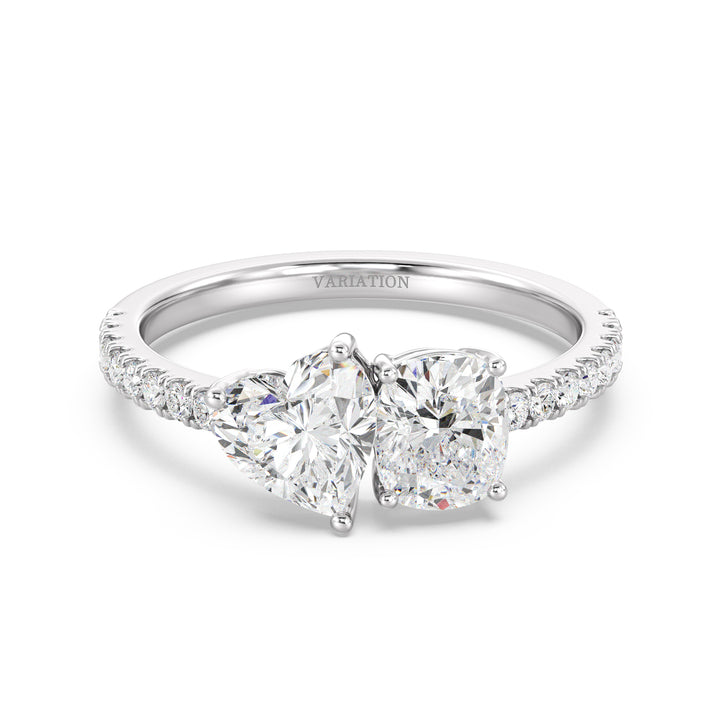 Sophisticated Heart & Cushion Two-Stone Lab-Grown Diamond 'Toi et Moi' Ring in 18K White Gold. Designed with a 1.00ct heart-cut and a 1.00ct cushion-cut EF/VS lab-grown diamond, complemented by 16 round-cut diamonds (0.24ct) on a sleek white gold band