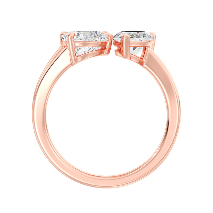 Three-Stone Toi et Moi Lab-Grown Diamond Ring in 18K Rose Gold, showcasing a 1.00ct Heart, 1.00ct Pear, and 1.00ct Emerald-cut EF/VS clarity diamonds in a classic prong setting. The romantic rose gold band beautifully contrasts with the diamonds, offering a modern yet vintage-inspired aesthetic