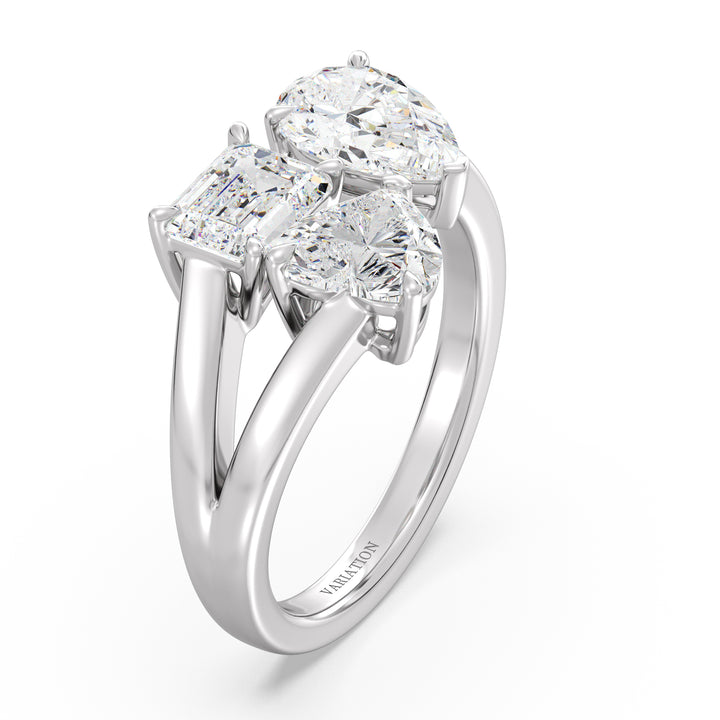Three-Stone Toi et Moi Lab-Grown Diamond Ring in 18K White Gold, featuring a 1.00ct Heart, 1.00ct Pear, and 1.00ct Emerald-cut EF/VS clarity diamonds in a classic prong setting. The sleek white gold band enhances the diamonds' brilliance, delivering a sophisticated and contemporary appeal.