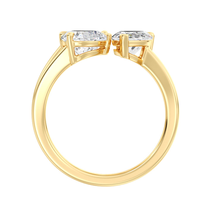 Three-Stone Toi et Moi Lab-Grown Diamond Ring in 18K Yellow Gold, featuring a 1.00ct Heart, 1.00ct Pear, and 1.00ct Emerald-cut EF/VS clarity diamonds in a classic prong setting. The warm yellow gold band enhances the brilliance of the diamonds, creating a timeless and elegant look