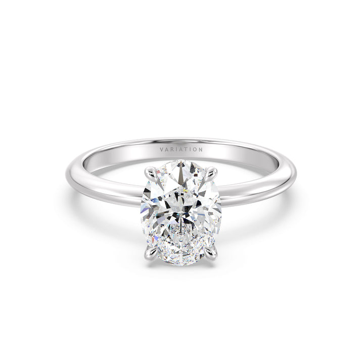 Timeless 4-Claw Oval Lab-Grown Diamond Solitaire Engagement Ring in 18K White Gold, highlighting a dazzling oval-cut diamond in a timeless prong setting