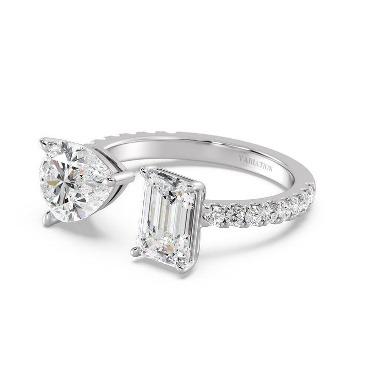 Timeless Two-Stone Toi et Moi Lab-Grown Diamond Ring in 18K White Gold, featuring a 2.00ct EF/VS Pear-Cut and a 2.00ct EF/VS Emerald-Cut diamond in a four-prong setting. The sleek white gold band is accented with 16 round brilliant lab-grown diamonds totaling 0.34ct, offering a sophisticated and radiant appeal
