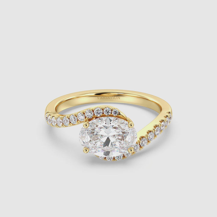 18K Yellow Gold Oval Lab-Grown Diamond East-to-West Bypass Pavé Engagement Ring – Featuring a 1.50ct EF/VS Oval-Cut Center Diamond with 22 Round Pavé-Set Lab Diamonds (0.19ct Total) on a Twisted Band. Modern, Elegant, and Timeless Design